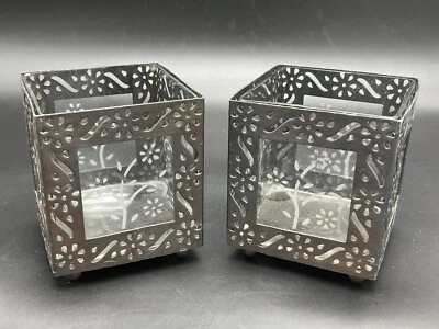 Juego de 2 candelabros decorativos de metal marrón con inserción de vidrio floral Foto 1 de 4