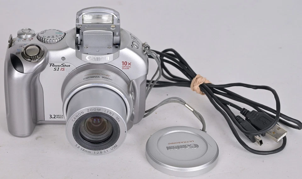 Tested Working Canon PowerShot S1 IS 3.2MP 10X Zoom Bridge Digital Camera - Image 1 of 4
