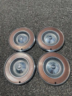 Factory original Ford Maverick Torino Comet 14 inch hubcaps wheel covers brown - Image 1 of 4