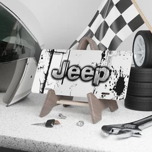 Placa de matrícula de tocador frontal con salpicaduras de pintura blanca y negra Jeep - Imagen 1 de 7