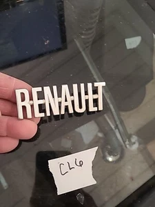 VINTAGE 3 9/16" LONG X 1 3/16" TALL RENAULT METAL EMBLEM OEM - Picture 1 of 4