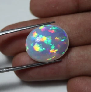 15.6 Carat Natural Rainbow Fire Ethiopian White Opal Oval Cabochon 20.7x17.4 MM - Picture 1 of 18