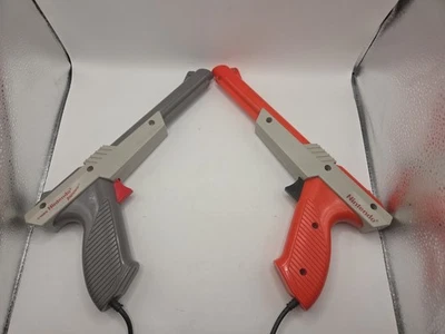 Lot of 2 Nintendo NES Zapper Light Gun Controller Orange and Gray - Image 1 of 4