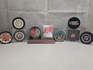 NJ Devils Official Pucks Lot of 8. Limited Edition St Patrick's & 2000 Stanley + - Picture 1 of 21