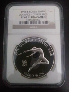 1988 SOUTH KOREA 10000 WON OLYMPICS GYMNATICS NGC PF 69 ULTRA CAMEO HIGH GRADE - Picture 1 of 2