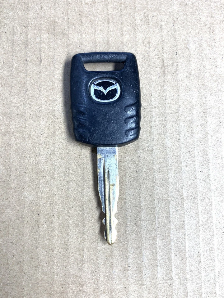 Llave de puerta de encendido negra y cromada de fábrica Mazda OEM Foto 1 de 1