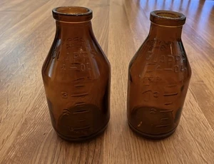 2 biberon vintage in vetro ambrato 4 oz succo Clapp's per bambini 1957 - Foto 1 di 7
