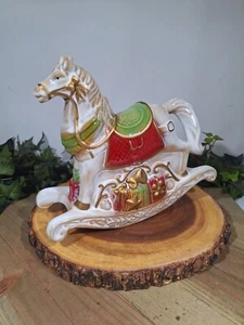 Musica porcellana cavallo a dondolo oro e bianco suona ti auguriamo buon Natale - Foto 1 di 6