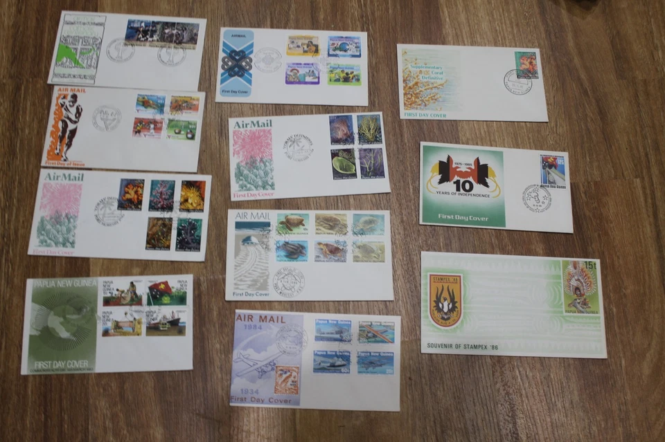 1982-86 PAPUA NEW GUINEA PNG COVERS FDC x 11 CORALS,TURTLES,COMM GAMES, AIR MAIL - Image 1 of 1