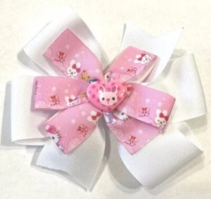 Beautiful Bunny on a pink heart inspired hair bow for girls.  - Picture 1 of 3