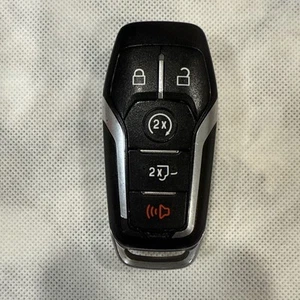 USED OEM 2017 FORD F150 SMART KEY 5 BUTTON. FCC ID: M3N-A2C31243300 - Picture 1 of 3