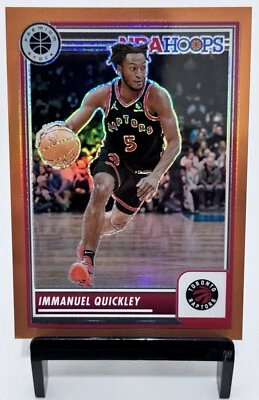 2023-24 NBA Hoops Premium Immanuel Quickley /299 Orange Prizm #105 Raptors - Image 1 of 2
