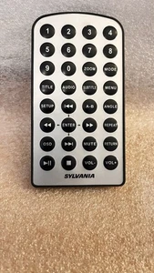 Control remoto SYLVANIA para reproductor de DVD portátil de doble pantalla SDVD9957 probado - Imagen 1 de 5