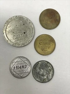 Lote de fichas vintage: ficha Heads Tails Rock Island casino, etc. - Imagen 1 de 8