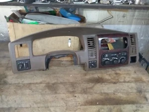 2001-2003 DODGE DURANGO RADIO DASH GAUGE BEZEL ASSEMBLY TAN w/CLIMATE CONTROL OE - Picture 1 of 24
