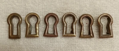 LOT OF SIX ANTIQUE FLUSH MOUNT OR INSERT BRASS ESCUTCHEON KEYHOLE COVERS - Image 1 of 4