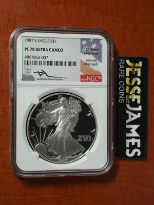 1987 S PROOF SILVER EAGLE NGC PF70 ULTRA CAMEO JOHN MERCANTI SIGNED FLAG LABEL - Image 1 of 2