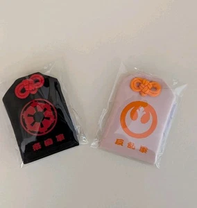 Star Wars Celebration Japan 2025 Exclusive Imperial & Rebel Omamori Amulet Charm - Picture 1 of 2