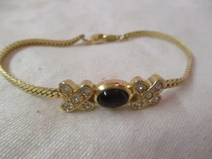 Vintage Avon gold tone Bracelet with clear Rhinestones & black glass Cabochon - Picture 1 of 3