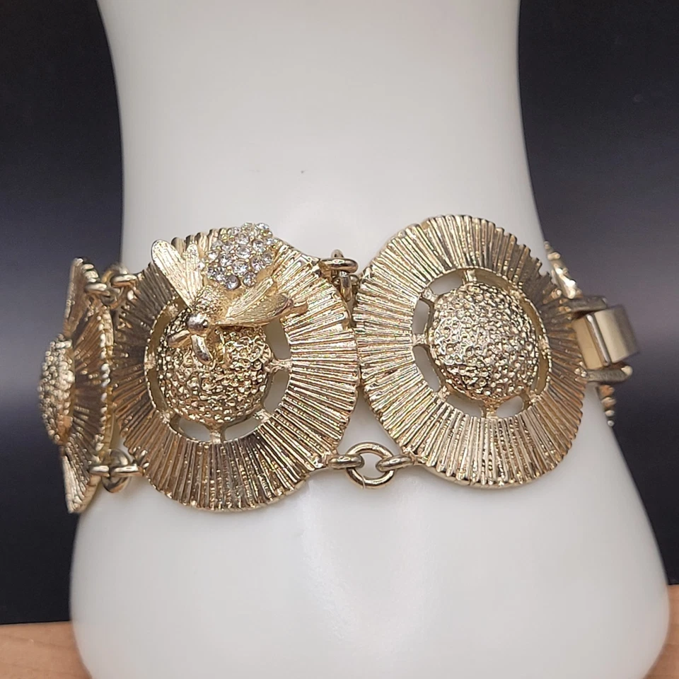 Brazalete de eslabones de disco de flores gruesas tono dorado vintage con estrás abejorro Foto 1 de 4