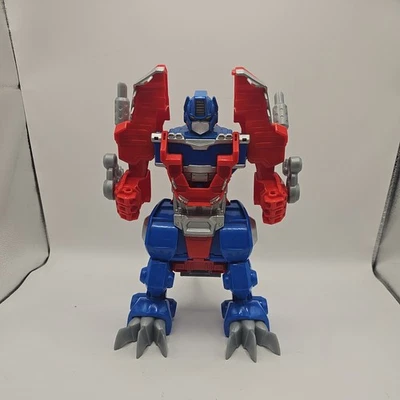 Transformers Playskool Heroes Rescue Bots Knight Watch Optimus Prime Dinosaur - Image 1 of 4