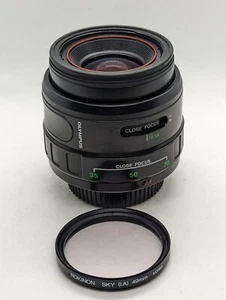 Olympus Objektiv 35–70 mm F3,5–4,5 PF Zoom mit 49 mm ROKINON Sky (IA) Filter - Bild 1 von 8