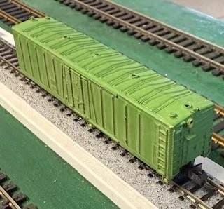 N Scale unbranded unlettered painted green 50’ PD boxcar w Rapido couplers - Image 1 of 1