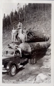 Camión maderero RPPC hombres en troncos Western Washington postal c1930 - Imagen 1 de 2