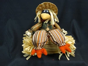 Decorative scarecrow figure on a bale - Picture 1 of 8