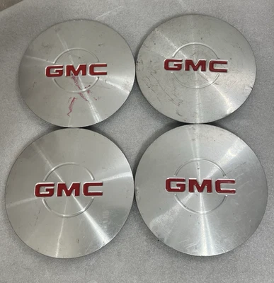 (4) Tapas centrales con acabado cepillado GMC Sierra Yukon Safari 1999-2005 OEM 15040220 Foto 1 de 4