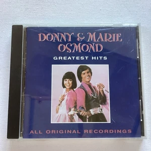 Best of Donny & Marie Osmond (CD, 1993) Deep Purple Umbrella Song Rock ‘N Roll - Foto 1 di 4