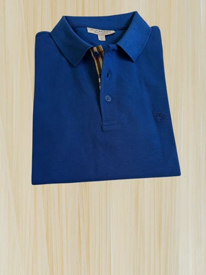 Camisa polo informal de manga corta a cuadros azul marino grande Burberry para hombre Foto 1 de 4