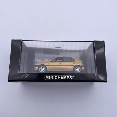 Coche Minichamps Peugeot 306 4 puertas escala 1:43 en caja dorado metálico 1998 Foto 1 de 4
