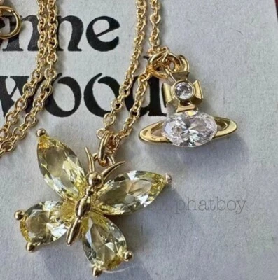 Colar pingente orbe transparente borboleta amarela elegante tom dourado Vivienne Westwood - Imagem 1 de 4