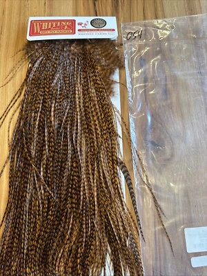 Silla de montar Whiting Farms PLATEADA Hackle: marrón teñido de grizzly 054 Foto 1 de 3