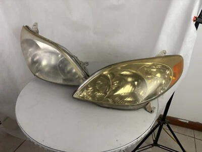 Pair 2003-2008 Toyota Matrix Headlight Headlamp Used - Image 1 of 4