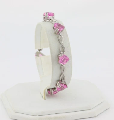 Brazalete de plata esterlina con corazón de zafiro rosa creado en laboratorio de 7 1/4 pulgadas Foto 1 de 4