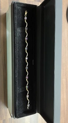 Brazalete de eslabones ondulados de oro amarillo de 9 quilates de 0,05 quilates con diamantes y topacio místico Longitud: 19 cm Foto 1 de 4