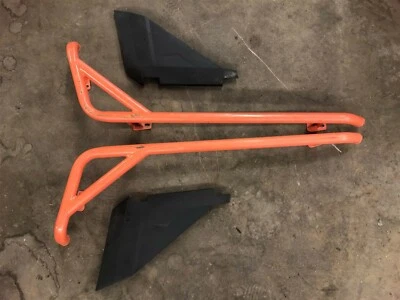 Polaris RZR S 900 60 EPS 1000 16 17 18 19 20 21 izquierda derecha barras Nerf naranja Foto 1 de 4