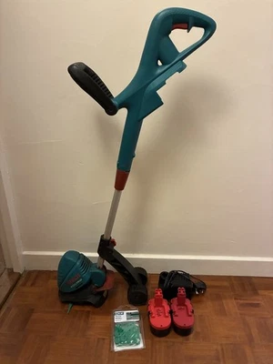 Bosch Art 23 18V Cordless Accutrim Garden Strimmer with blades, battery/charger - Image 1 of 4