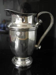 Jarra regaladora mango de cuero cromado - Imagen 1 de 5