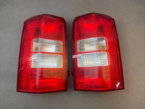 2007-17 Jeep Patriot Tail Light Set - Picture 1 of 4