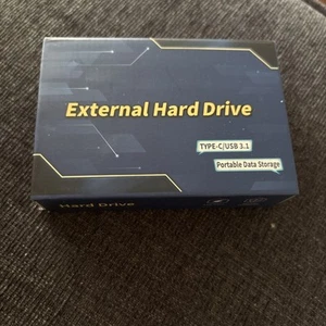 NIB 2 terabyte external ssd hard drive for pc or android, adapter included. - Picture 1 of 2