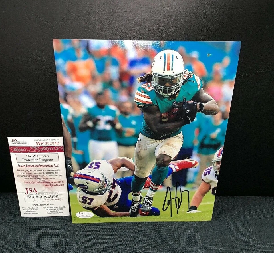 JAY AJAYI MIAMI DOLPHINS SIGNED 8X10 PHOTO WITNESS JSA COA WP302842 - Image 1 of 1