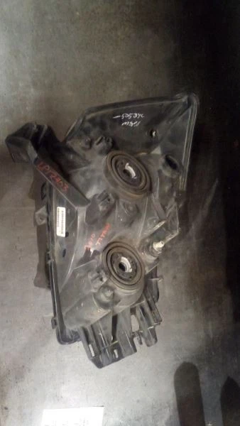 Левая фара для Nissan Titan 2010 года выпуска 6380750 - Изображение 1 из 2