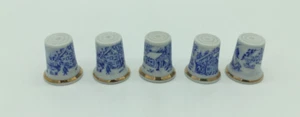 Konvolut (5) Porzellan mit blauen Kabinen Fingerhüte, Goldband und Winterszenen - Bild 1 von 2