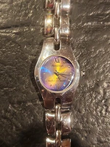 "Reloj Armitron Now para mujer tono plateado esfera redonda púrpura 30M nuevo batería 7,25" - Imagen 1 de 5
