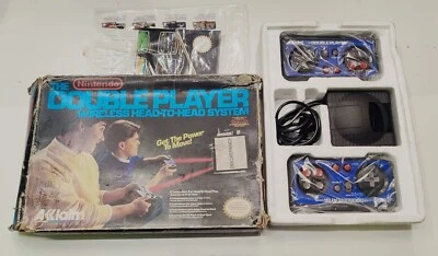 JOYPAD NINTENDO NES THE DOUBLE PLAYER - WIRELESS HEAD-TO-HEAD SYSTEM  CONTROLLER - Immagine 1 di 4