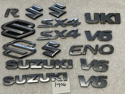 Suzuki SX4 AWD emblema trasero maletero logotipo placa de identificación conjunto OEM lote Foto 1 de 4