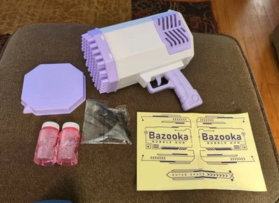 Lanzacohetes Mágico 69 Agujeros Luces LED Soplador de Burbujas Pistola Bazuca Máquina Juguete Foto 1 de 4